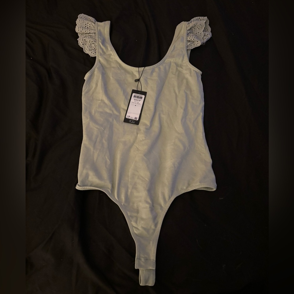 5/$25 Body Suit Brand new